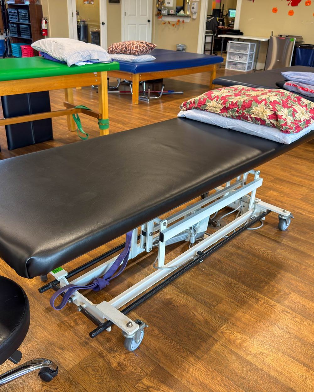 Physical therapist performing hands on manual therapy with a patient at Castroville Physical Therapy