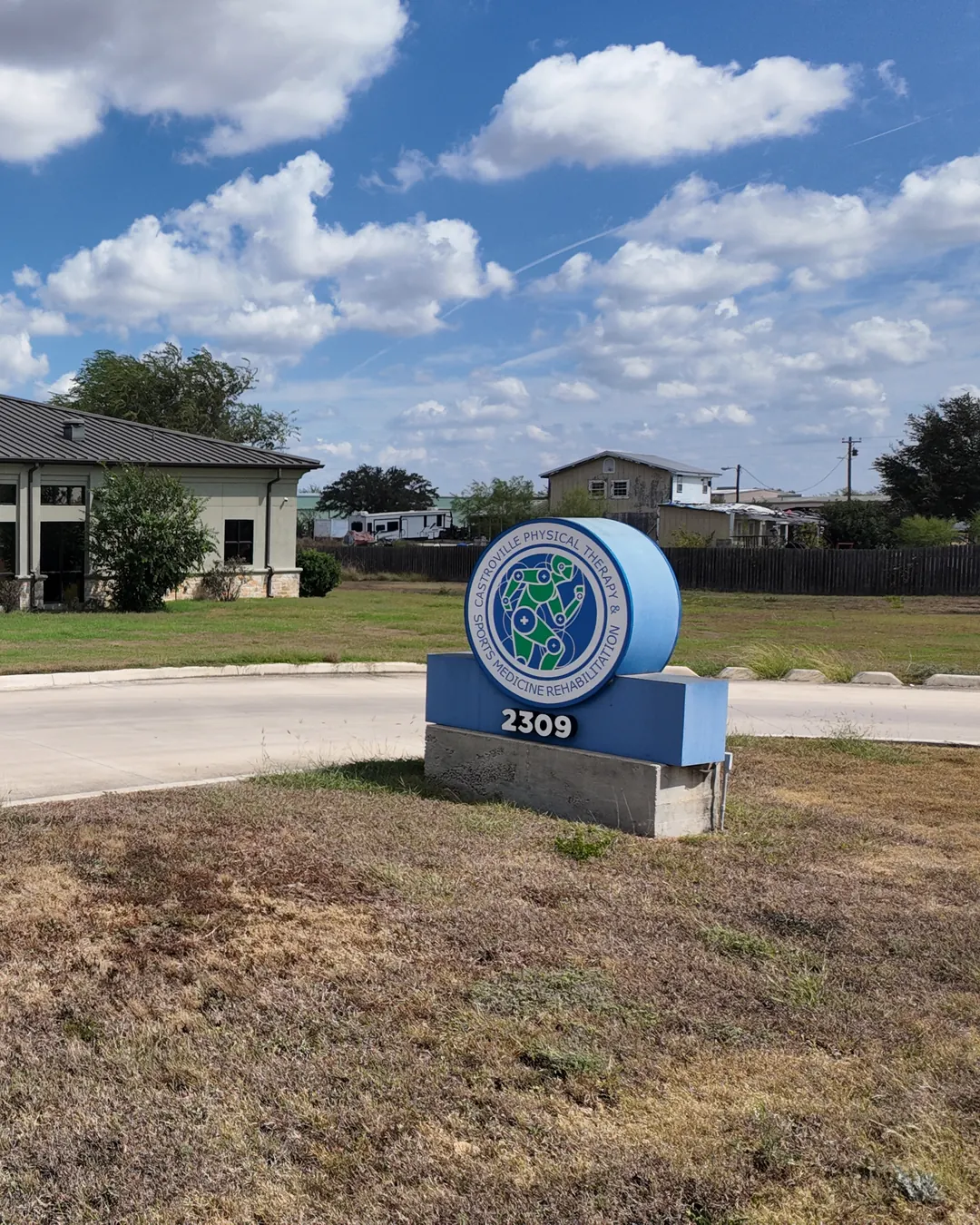 The Castroville Physical Therapy & Sport Rehabilitation monument sign and clinic building at 2309 US-90 W