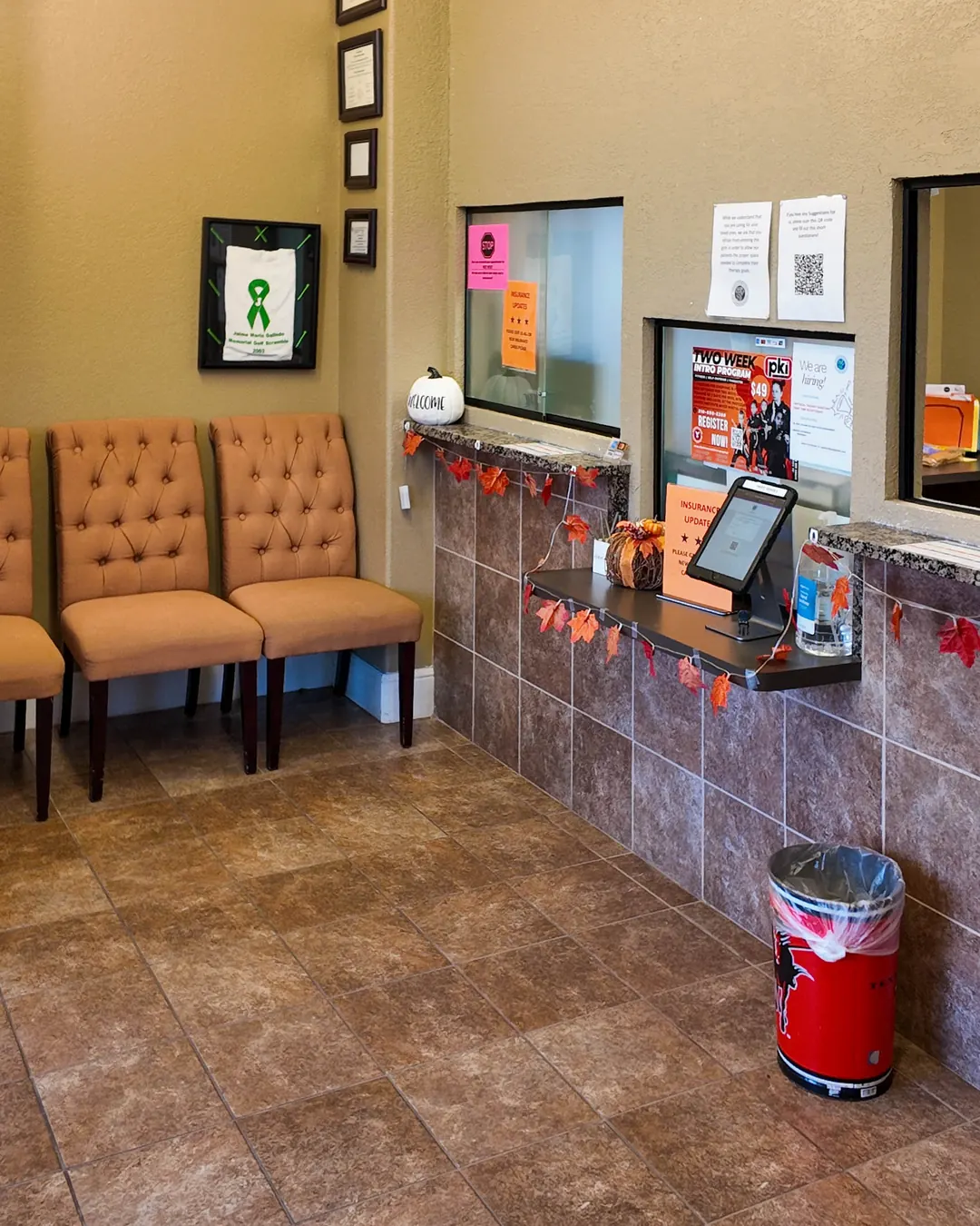 The front desk and waiting area where new patients check in at Castroville Physical Therapy & Sport Rehabilitation